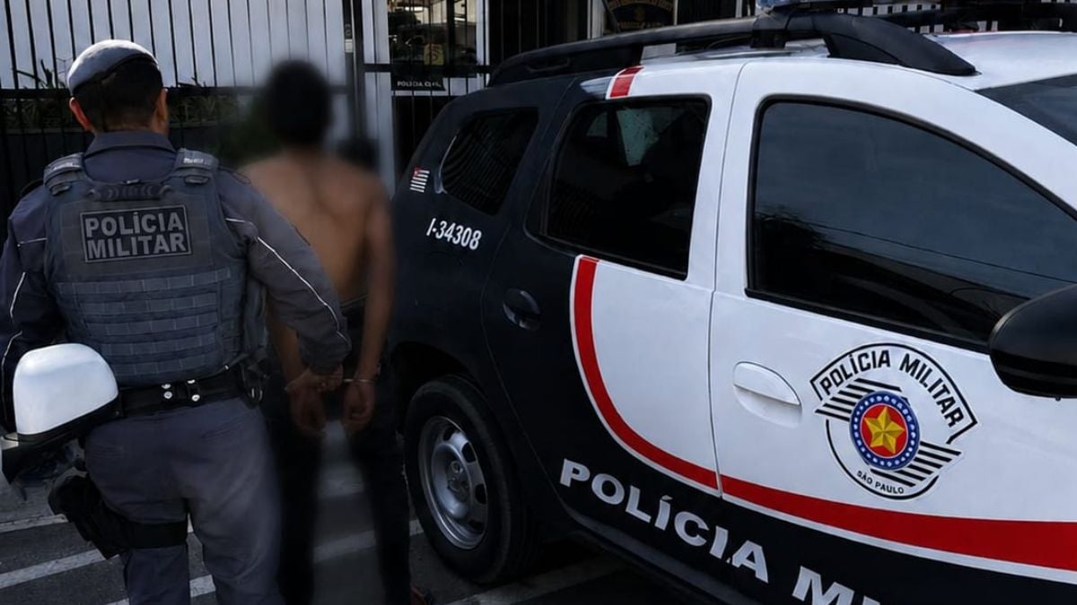 Polícia Militar com viatura na frente de um homem algemado, em registro que ilustra tentativa de latrocínio em Atibaia após roubo e tentativa de homicídio.