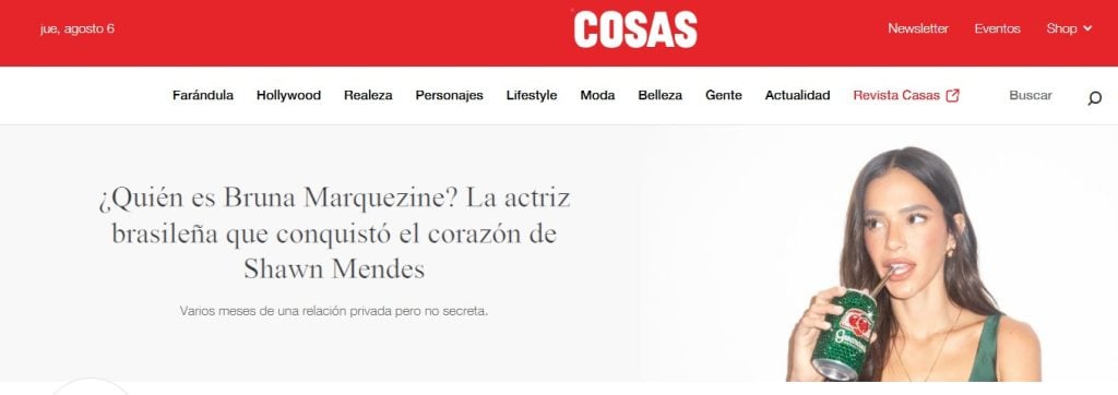 Notícia sobre o romance de Bruna Marquezine e Shawn Mendes repercutindo na mídia internacional, com Bruna Marquezine em destaque em página de revista online.