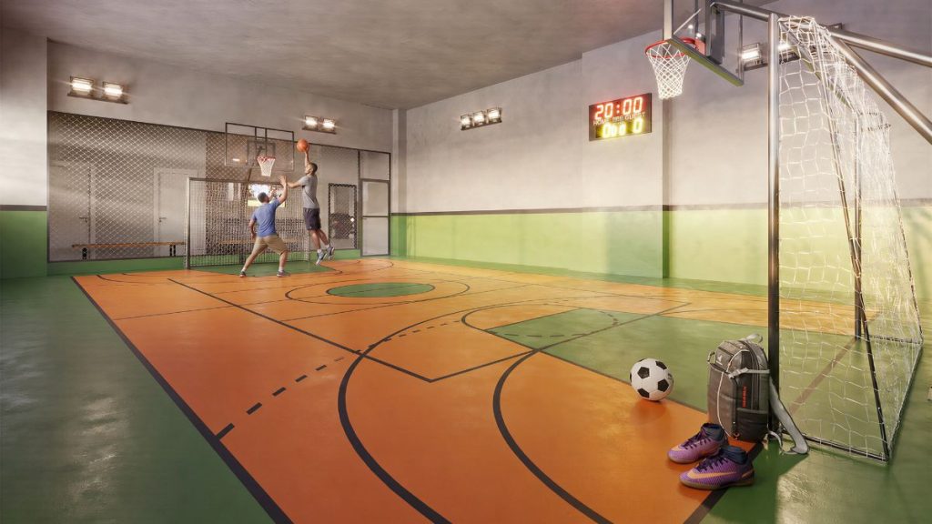 Gran Canal Residence em Santos: Quadra esportiva coberta em ambiente de lazer de empreendimento imobiliário, com pintura no piso, redes de futsal e iluminação artificial no teto.