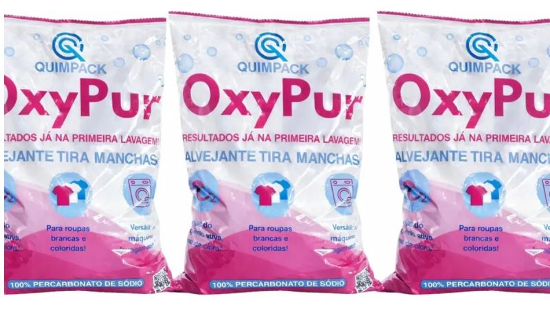 anvisa produtos de limpeza: Embalagens de produtos de limpeza da marca QUIMPACK com rótulo OxyPur e texto sobre alvejante para roupas brancas e coloridas, em imagem promocional