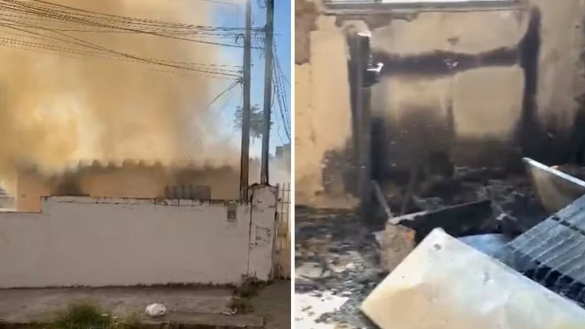 Cena de incêndio em casas após discussão entre vizinhos após corte de um fio de internet, com fios e postes ao fundo e área danificada por fogo em Americana.