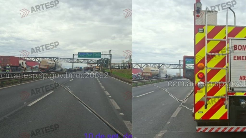 Rodovia com faixa de tráfego e passarela ao fundo, céu nublado; à direita, caminhão de emergência com pintura amarela e vermelha e inscrições “BOMBEIROS” e “EMERGÊNCIA”.