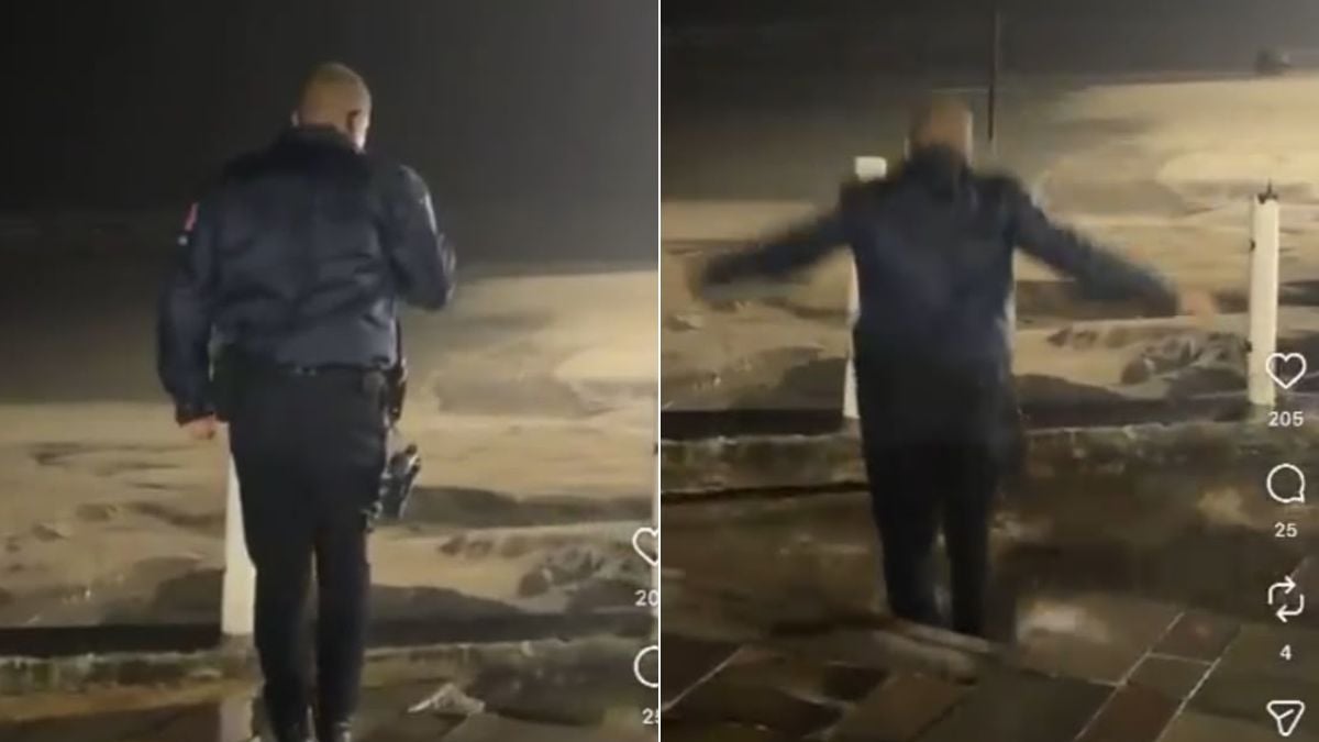 GCM cai em cratera em Praia Grande: Vídeo registra GCM em segurança ao lado de uma grande cratera aberta na orla de Praia Grande, durante chuva, com o agente sendo atingido pela abertura do chão.