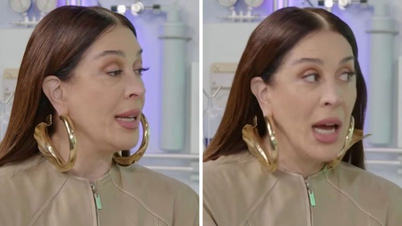 Claudia Raia em entrevista, falando com expressão séria e usando brincos grandes dourados, em cena de estúdio; ela revela ter sido presa aos 15 anos na Argentina.