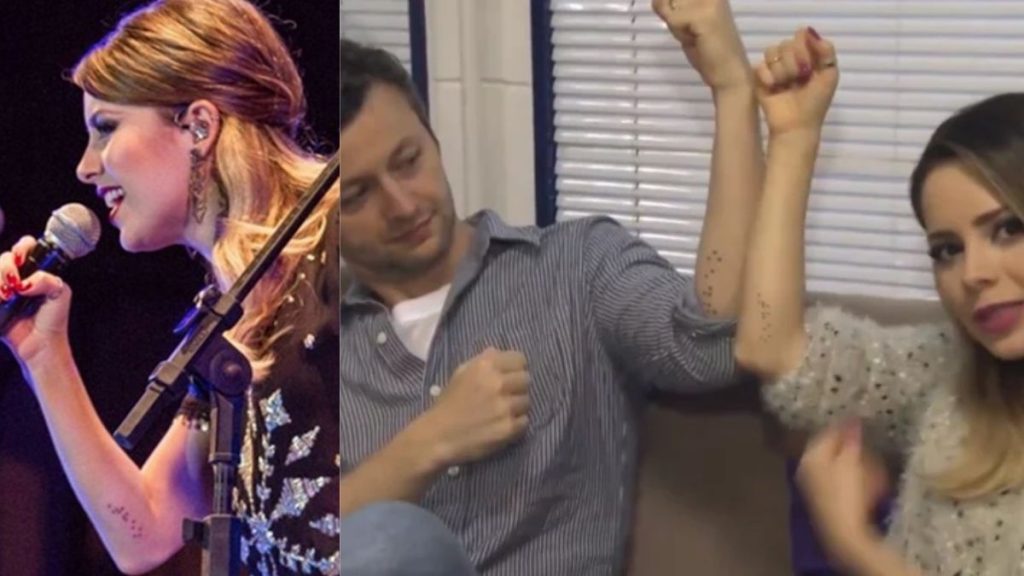 Sandy e Lucas Lima mostram tatuagens em homenagem ao filho, Theo.