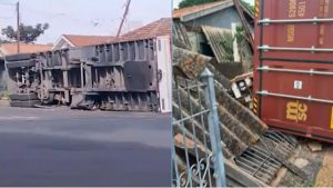 Contêiner de carga tombado na via atinge e destrói a frente de uma casa em Americana após o asfalto ceder.